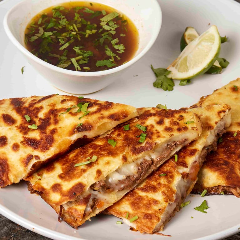 Indulge in Our Quesadilla